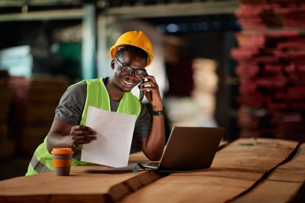 Worker discussing a fire compartmentation survey on the phone